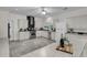 Well-lit kitchen with ample counter space, updated appliances, and plenty of cabinet storage at 1085 Harts Bluff Rd, Wadmalaw Island, SC 29487