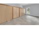 Spacious storage space with full wall of cabinets and tile floors at 1085 Harts Bluff Rd, Wadmalaw Island, SC 29487