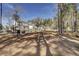 Spacious backyard featuring pool, outdoor fireplace and plenty of room for recreation at 1098 Reserve Ln, Awendaw, SC 29429