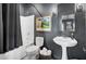 Modern bathroom featuring a shower/tub combo, toilet, and vessel sink with stylish fixtures at 1098 Reserve Ln, Awendaw, SC 29429