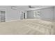 This bedroom features carpet, neutral walls, and a fan at 1098 Reserve Ln, Awendaw, SC 29429