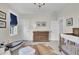 Bedroom with carpet and decor, a light fixture and a large window for natural light at 1098 Reserve Ln, Awendaw, SC 29429