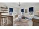 Bright Bedroom with a crib, rocking chair, and plenty of natural light at 1098 Reserve Ln, Awendaw, SC 29429