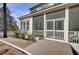 Outdoor deck with screened in porch and outdoor access at 1098 Reserve Ln, Awendaw, SC 29429