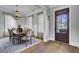 Charming dining room featuring a chandelier, wood table, and abundant natural light at 1098 Reserve Ln, Awendaw, SC 29429