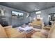 The game room boasts a flatscreen TV, comfortable sofas, and a stylish coffee table at 1098 Reserve Ln, Awendaw, SC 29429
