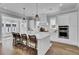 Spacious kitchen featuring a large center island with seating and pendant lighting at 1098 Reserve Ln, Awendaw, SC 29429