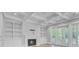 The living room has a coffered ceiling, built-in shelving, a fireplace, and access to a porch at 1098 Reserve Ln, Awendaw, SC 29429