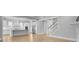 Open-concept living space flows seamlessly between the kitchen and stairs at 1098 Reserve Ln, Awendaw, SC 29429
