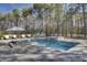 Backyard pool, hot tub with patio furniture and view of the home at 1098 Reserve Ln, Awendaw, SC 29429