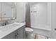 Clean bathroom featuring a tiled shower and bathtub, and a modern vanity with sink at 1129 Shady Grove Ln, Mount Pleasant, SC 29464