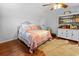 Charming bedroom with a pitched ceiling, wooden floors, and a decorative rug at 1129 Shady Grove Ln, Mount Pleasant, SC 29464