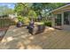 Newly refinished deck with wicker furniture seating area for outdoor living at 1129 Shady Grove Ln, Mount Pleasant, SC 29464