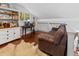 Comfortable loft featuring a built-in bar and shelving beside a large window at 1129 Shady Grove Ln, Mount Pleasant, SC 29464