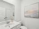 Bright bathroom with a white vanity, framed mirror, and modern fixtures at 114 Rust Rail Way, Summerville, SC 29485
