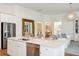 Bright kitchen with a large island, stainless steel appliances, and seating creates a functional and inviting space at 114 Rust Rail Way, Summerville, SC 29485