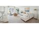 Bright living room features neutral tones and comfortable seating area with large windows at 114 Rust Rail Way, Summerville, SC 29485