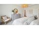 Serene main bedroom featuring a cozy wicker chair, dresser, and natural light at 114 Rust Rail Way, Summerville, SC 29485