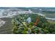 Stunning aerial view of the property, located in a serene neighborhood near a tranquil lagoon at 1143 Sea Eagle Watch, Charleston, SC 29412