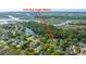 Aerial view of 1143 Sea Eagle Watch nestled in a picturesque coastal community near a tidal marsh at 1143 Sea Eagle Watch, Charleston, SC 29412