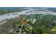Picturesque aerial shot of the property situated near a lagoon, providing scenic neighborhood views at 1143 Sea Eagle Watch, Charleston, SC 29412