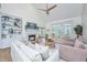 Cozy living room with fireplace, built-in bookshelves, and comfortable seating arrangement at 1143 Sea Eagle Watch, Charleston, SC 29412