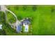 Aerial view of a house with a pool, large yard, and surrounded by trees at 120 Greenhill Pastures, Summerville, SC 29483