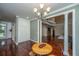 Charming breakfast nook with hardwood floors, decorative lighting, and built-in storage at 120 Greenhill Pastures, Summerville, SC 29483
