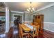 Cozy dining room features hardwood floors and traditional furnishings at 120 Greenhill Pastures, Summerville, SC 29483