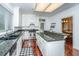 Updated kitchen features granite countertops, white cabinets and hardwood floors at 120 Greenhill Pastures, Summerville, SC 29483