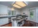 Bright kitchen with granite counters, stainless appliances, and eat-in bar at 120 Greenhill Pastures, Summerville, SC 29483