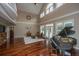 Large living room features vaulted ceilings, hardwood floors, and a piano at 120 Greenhill Pastures, Summerville, SC 29483