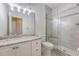 Updated bathroom with granite counters and walk-in shower at 1208 Wynnwood Ct, Mount Pleasant, SC 29466