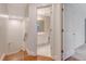 Hallway view of the bathroom featuring a vanity, toilet and tiled floors at 1208 Wynnwood Ct, Mount Pleasant, SC 29466