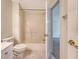 Bathroom featuring a toilet and shower-tub combo with a view into the Primary bedroom at 1208 Wynnwood Ct, Mount Pleasant, SC 29466