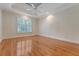 Light and airy bedroom with hardwood floors and large windows with plantation shutters at 1208 Wynnwood Ct, Mount Pleasant, SC 29466