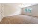 Bright, neutral bedroom featuring a ceiling fan and a window with blinds at 1208 Wynnwood Ct, Mount Pleasant, SC 29466