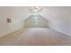 Spacious bonus room featuring carpet, a window, and two doors at 1208 Wynnwood Ct, Mount Pleasant, SC 29466