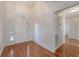 Inviting foyer features hardwood floors, ample natural light, and seamless access to other rooms at 1208 Wynnwood Ct, Mount Pleasant, SC 29466