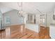 Bright, open-concept kitchen with wood floors, granite counters, and stainless steel appliances at 1208 Wynnwood Ct, Mount Pleasant, SC 29466