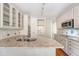 Well-appointed kitchen with white cabinets, granite countertops, and stainless steel appliances at 1208 Wynnwood Ct, Mount Pleasant, SC 29466