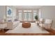 Bright and airy living room with stylish furniture, decor, and natural light from the windows at 1208 Wynnwood Ct, Mount Pleasant, SC 29466