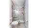 Tiled walk-in shower with glass door and mosaic tile accents at 1208 Wynnwood Ct, Mount Pleasant, SC 29466