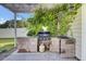 Backyard patio with outdoor kitchen, built in gas grill, and privacy at 123 Blackwater Way, Moncks Corner, SC 29461