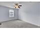 Bedroom with carpet, ceiling fan, white trim and one window for natural light at 123 Blackwater Way, Moncks Corner, SC 29461