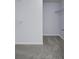 Walk-in closet featuring gray carpeted floors, crisp white walls, and practical wire shelving at 123 Blackwater Way, Moncks Corner, SC 29461