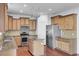 Stylish kitchen with granite countertops, stainless steel appliances, and a center island at 123 Blackwater Way, Moncks Corner, SC 29461