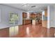 Modern kitchen with stainless appliances, center island, and sliding glass doors to yard at 123 Blackwater Way, Moncks Corner, SC 29461