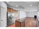 Spacious living room featuring a modern kitchen with stainless appliances and granite countertops at 123 Blackwater Way, Moncks Corner, SC 29461