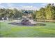 Community playground with slides, climbing features, and a soft ground surface at 123 Blackwater Way, Moncks Corner, SC 29461